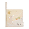 Baby fabric book with bunny design and sun on a white background
