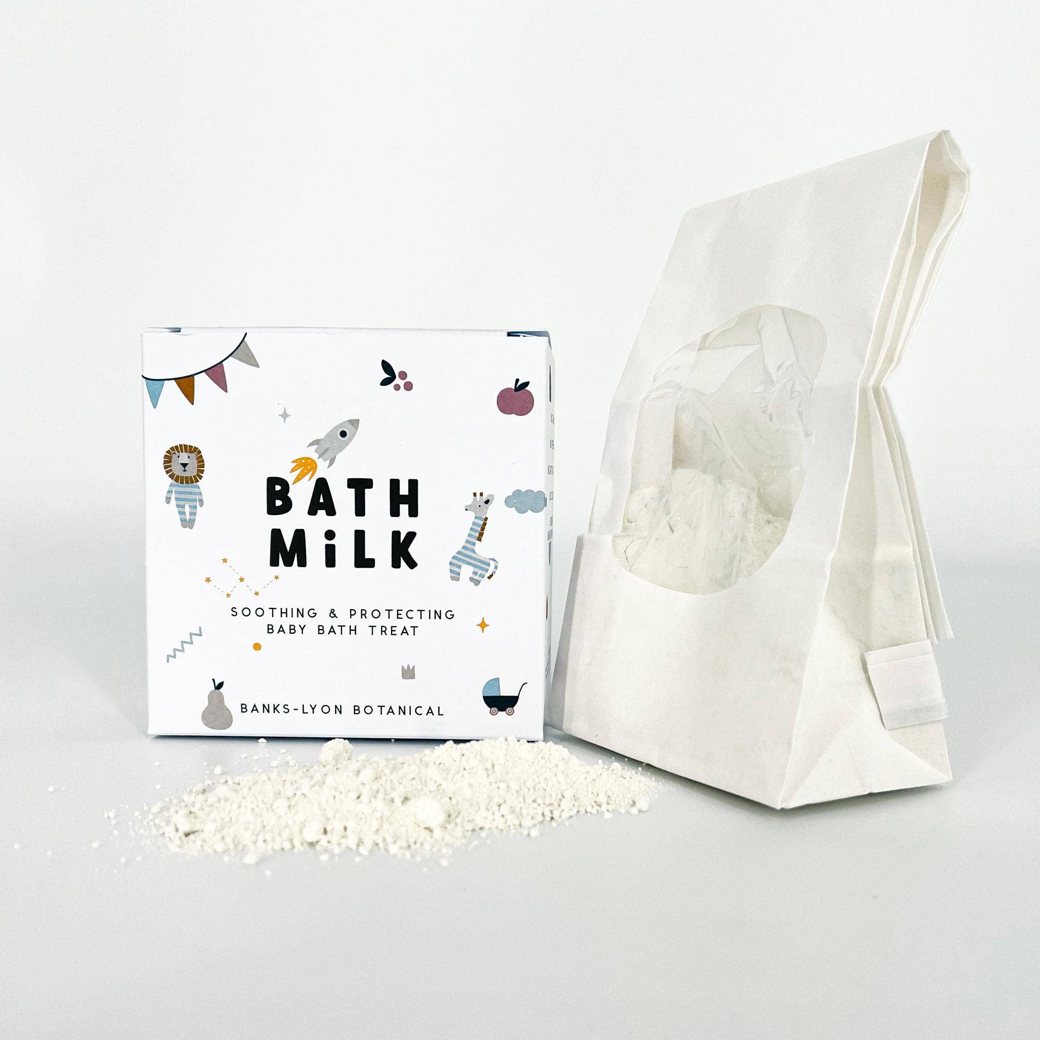 Bath milk packaging with a white bag and visible bath milk crystals on a light gray background
