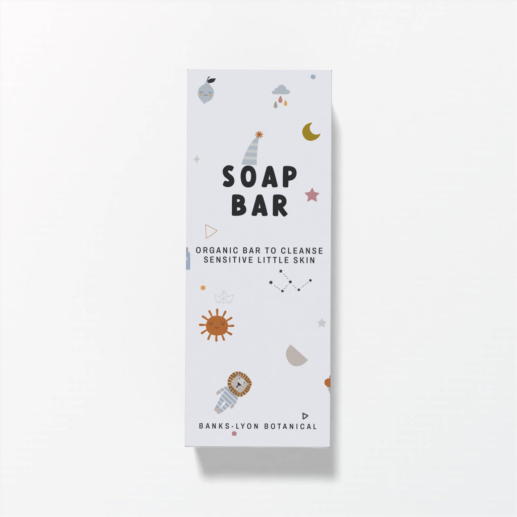 Soap bar packaging with cartoon illustrations on a white background