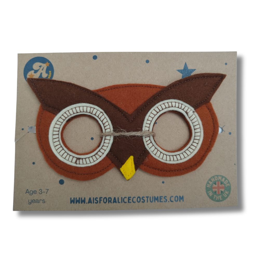 Owl-themed children's mask on a cardboard backing with branding information.