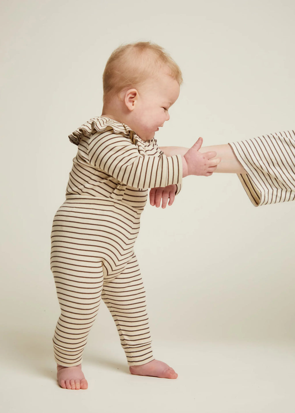 Baby wearing Claude&Co Milking it leggings