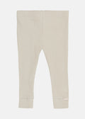 Beige ribbed leggings on a white background