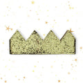 Gold glittery crown on a white background with gold stars