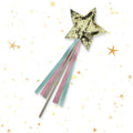 Star-shaped wand with colorful ribbons on a white background with gold stars