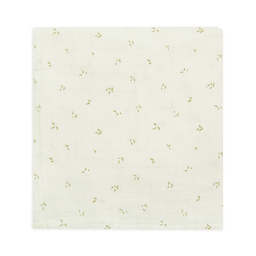 Floral patterned muslin swaddle on a white background