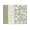 Three muslin square with different patterns on a white background