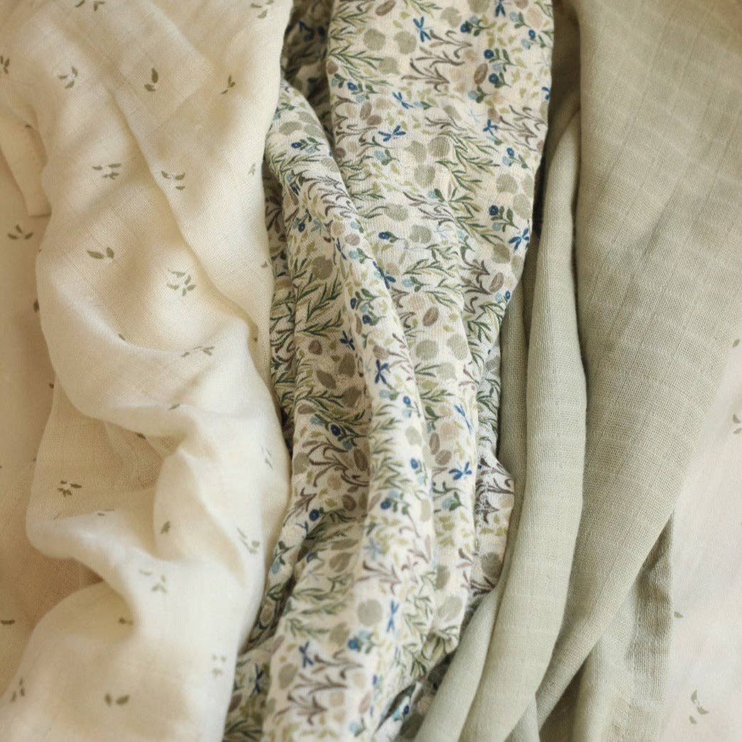 Three types of muslin squares with different patterns and textures.