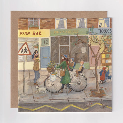 Illustrated card with a street scene featuring people and shops.