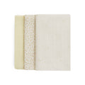 Three muslin swaddles in beige, white, and a patterned design on a white background